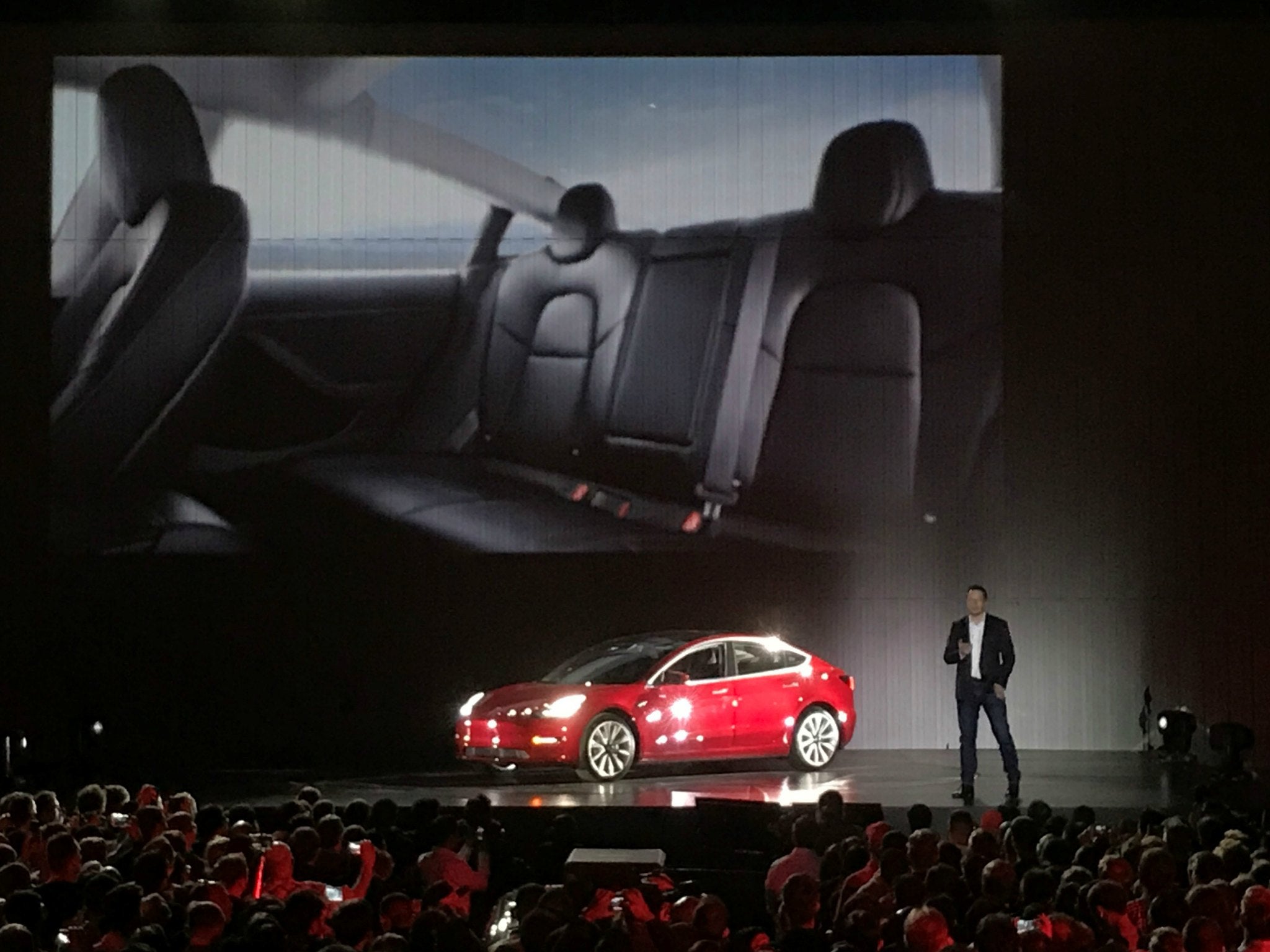 Tesla CEO Elon Musk talks about the company's new mass-market Model 3 during an event in Fremont, California on July 28, 2017