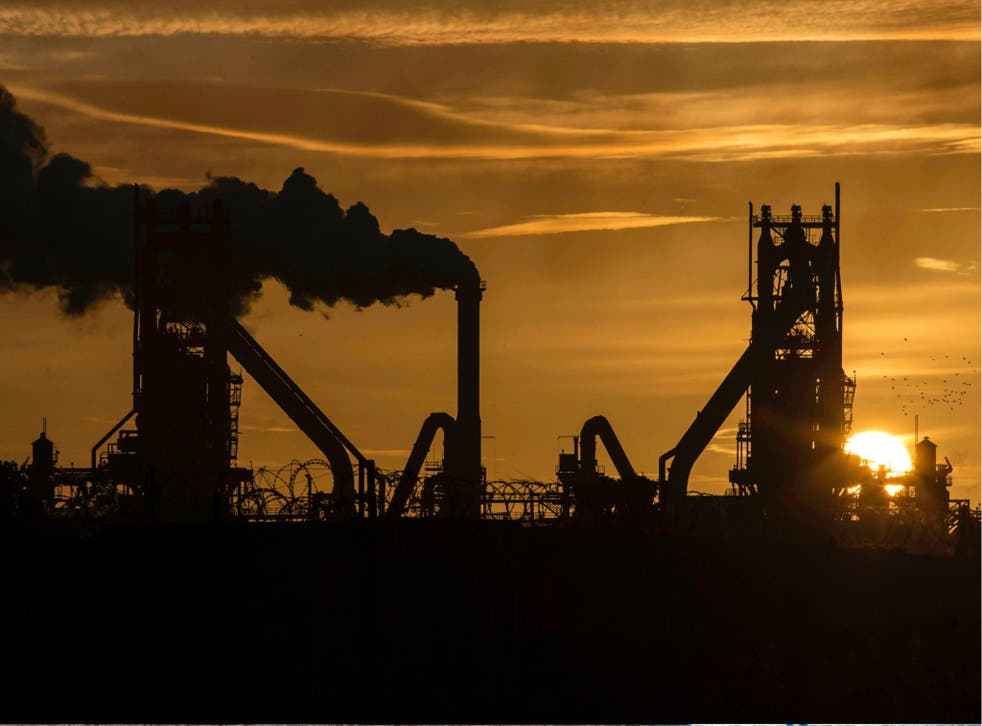 A British steel plant in north Lincolnshire, England. A new report detailing the devastating effects of increased carbon emissions on climate change may do more damage as a leaked report