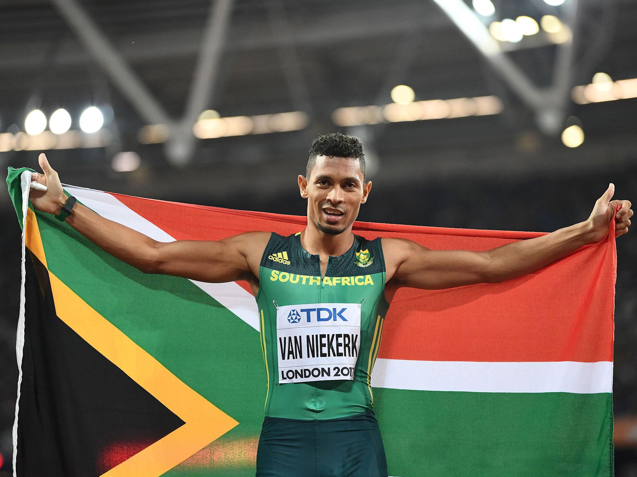 The South African celebrates his victory after running to gold in 43.98 seconds