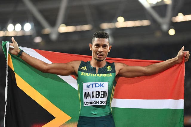 The South African celebrates his victory after running to gold in 43.98 seconds
