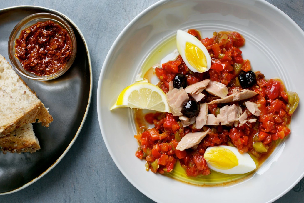 Roasted pepper and tomato salad with tuna and black olives