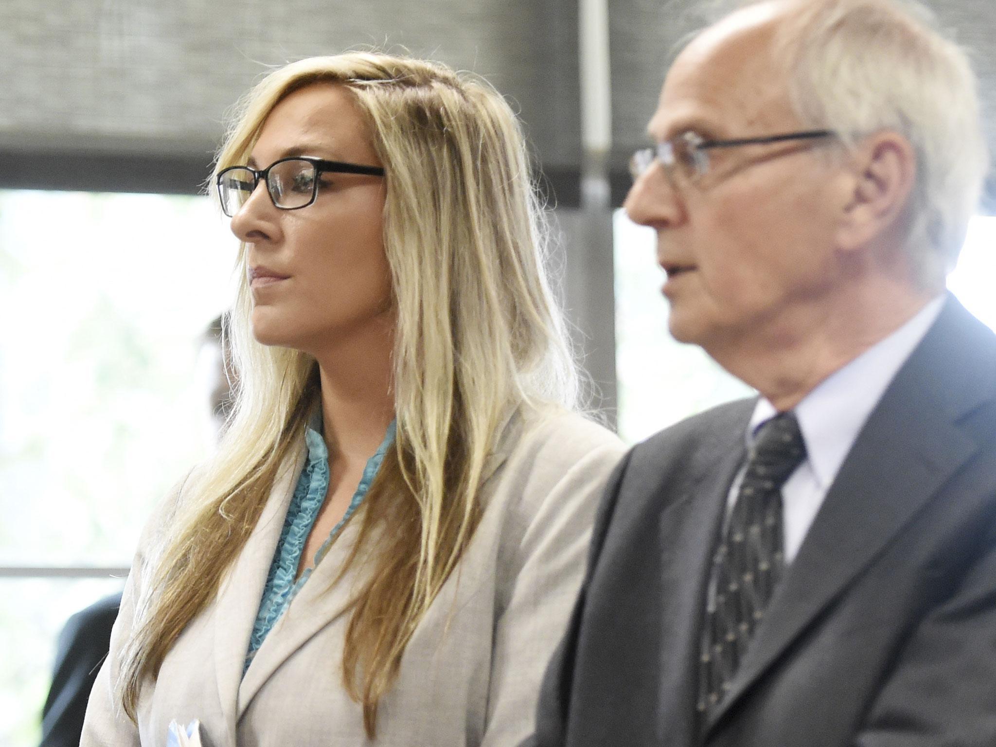 Brooke Lajiness stands in court during her sentencing hearing at the Washtenaw County Trial Court in Ann Arbor, Michigan