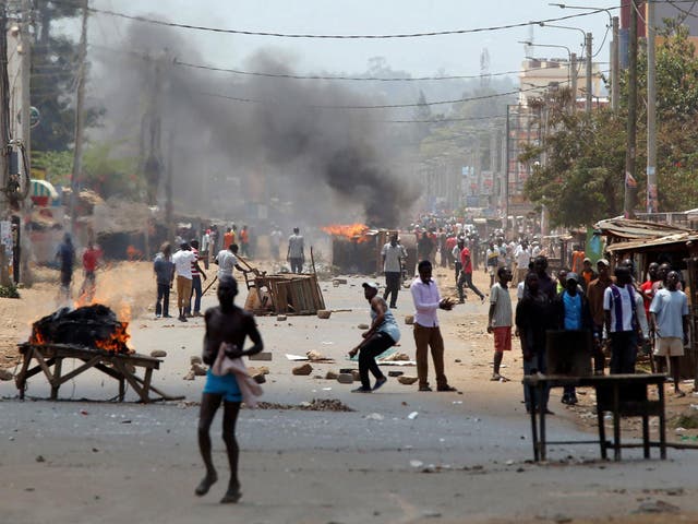 Demonstarters set barricades on fire in Kisumu, Kenya, on Wednesday