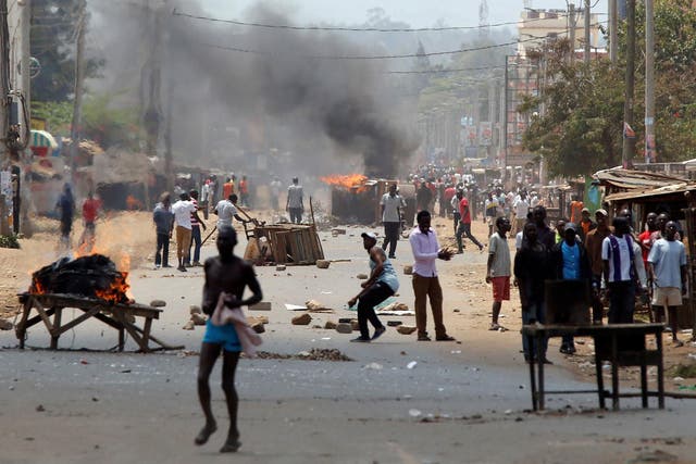 Demonstarters set barricades on fire in Kisumu, Kenya, on Wednesday