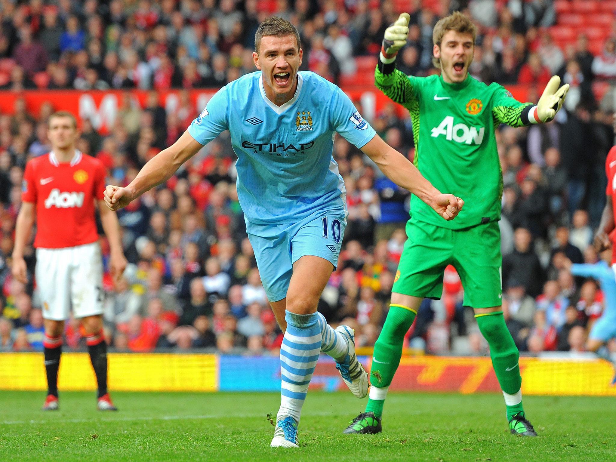 Dzeko netted as City famously made it six at Old Trafford