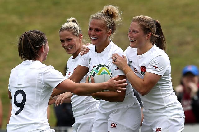 Kay Wilson scored four tries as England thrashed Spain 56-5 to begin their Rugby World Cup defence