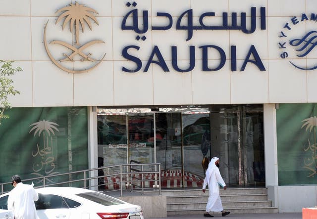 The national carrier of Saudi Arabia plans to enforce its strict dress code