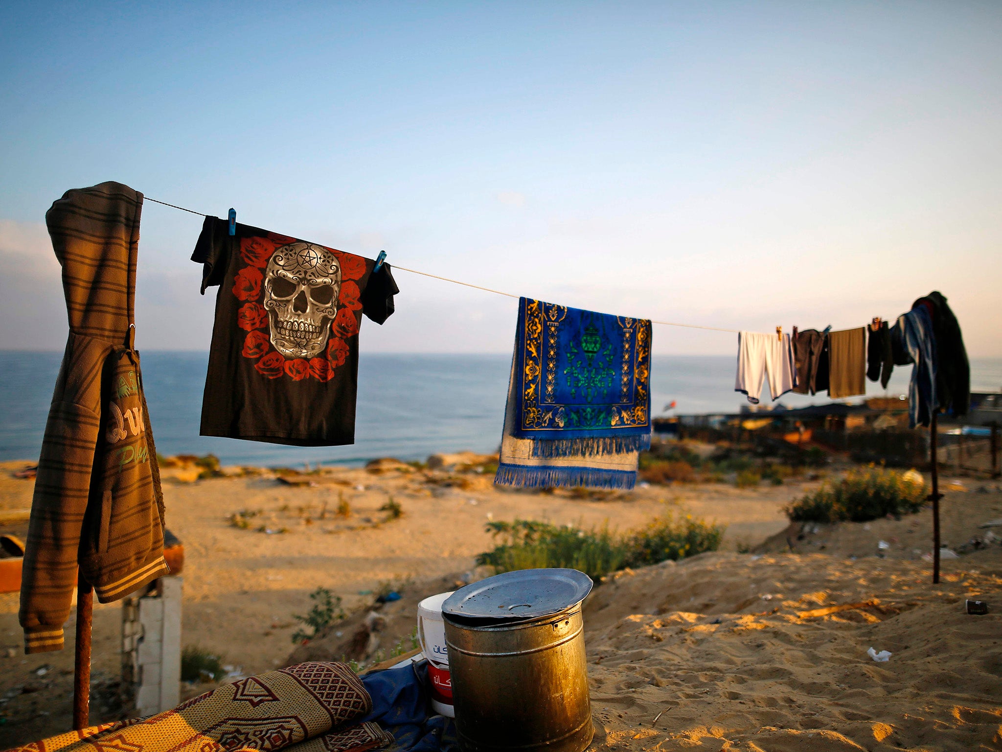 Clothes hanging near the Hamas base targeted by Israeli warplanes in Gaza City