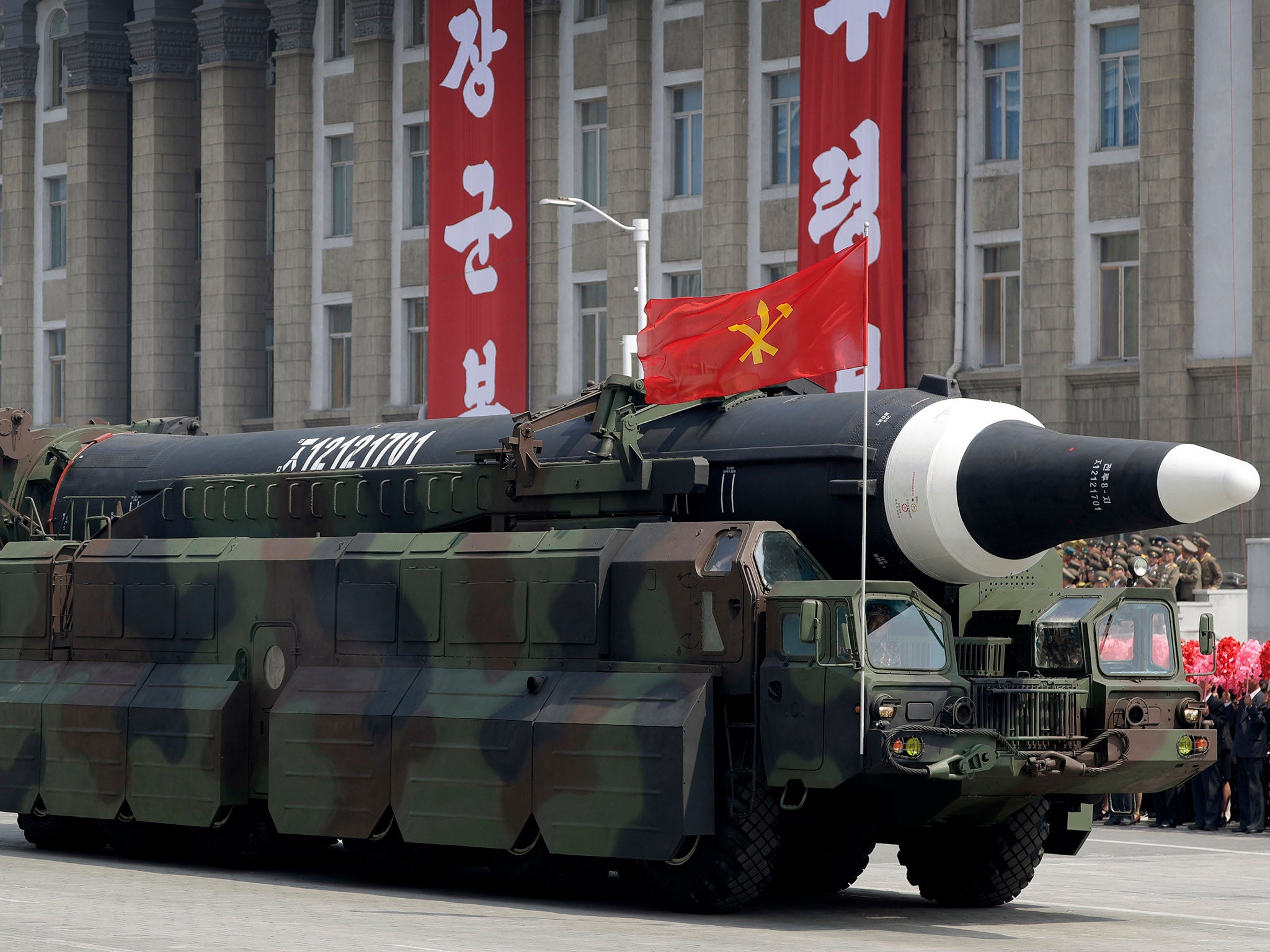 A missile that analysts believe could be the North Korean Hwasong-12 is paraded across Kim Il Sung Square in Pyongyang.