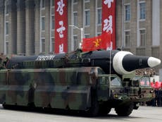 North Korea threatens Guam with 'salvo of missiles'