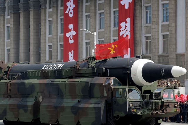 A missile that analysts believe could be the North Korean Hwasong-12 is paraded across Kim Il Sung Square in Pyongyang.