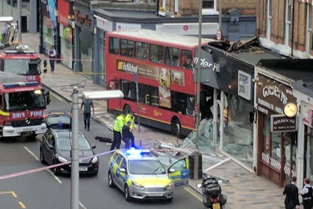 The bus left the road and hit a shop in Lavender Hill, southwest London