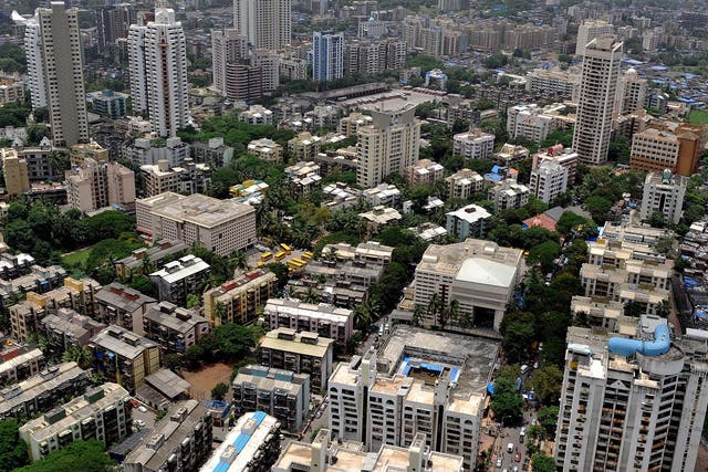 Residential apartment blocks seen from an under construction luxury apartment tower in Mumbai