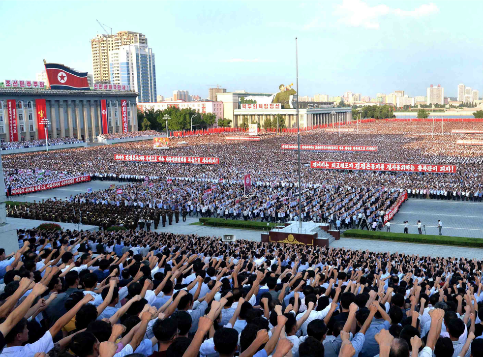 North Koreans rally en masse in Pyongyang on August 9, 2017