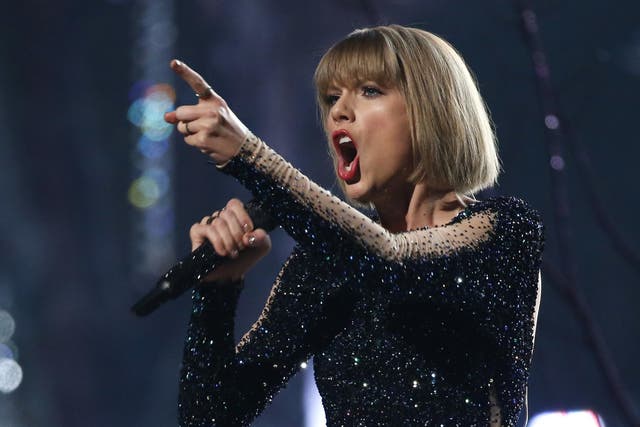 Taylor Swift performs "Out of the Woods" at the 58th Grammy Awards in Los Angeles, California