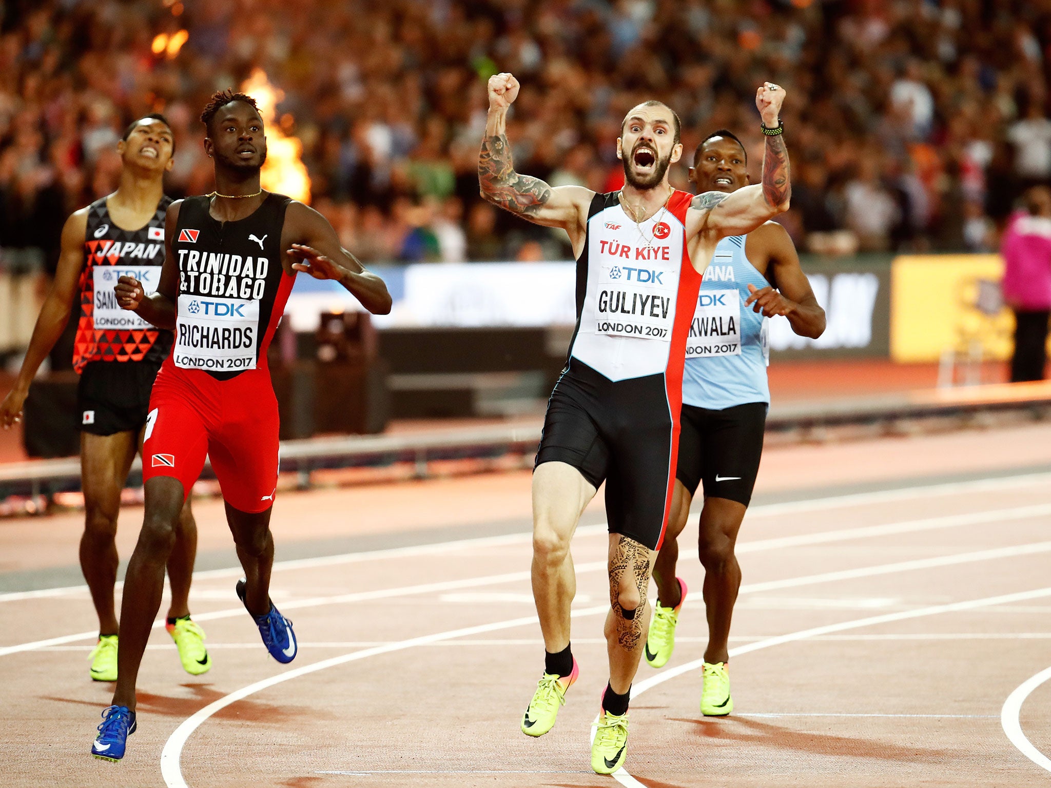 Ramil Guliyev celebrates after edging to gold in London