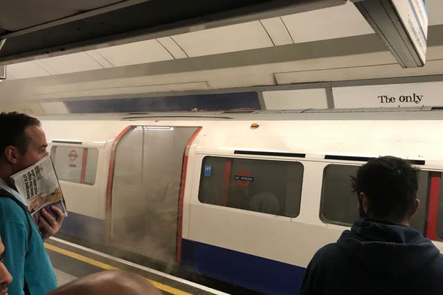Smoke coming out of a Bakerloo Line train at Oxford Circus station on 11 August