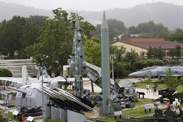 A mock North Korean Scud-B missile and South Korean missiles displayed at Korea War Memorial Museum in Seoul