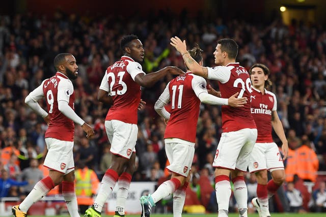Danny Welbeck scored on the stroke of half-time to draw Arsenal level