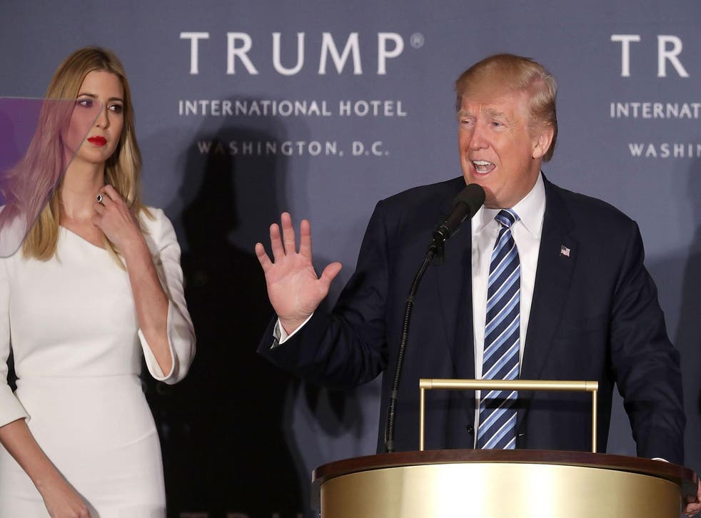 Donald Trump delivers remarks in October 2016 during the grand opening of the new Trump International Hotel with his daughter Ivanka Trump