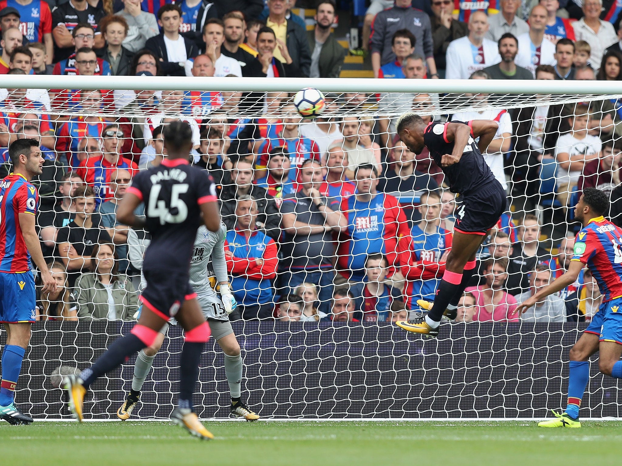 Mounie tries his luck with a headed attempt on goal