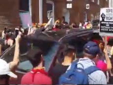 One dead as car hits crowd of anti-fascist protesters in Virginia