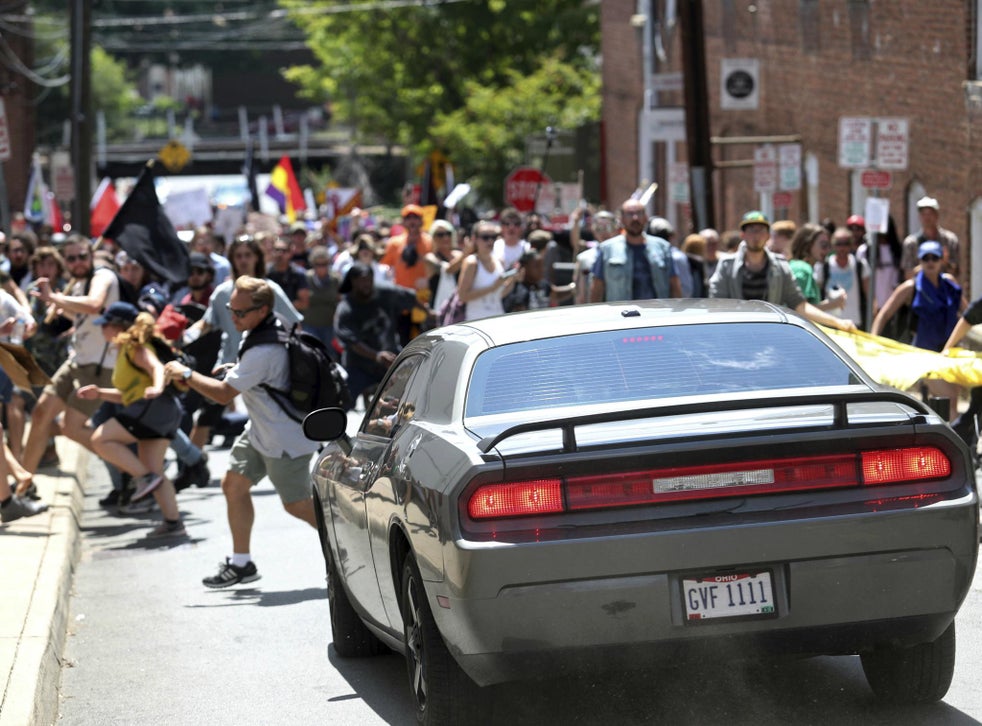 A car drives into protesters in Charlottesville Virginia One person was killed and more were injured