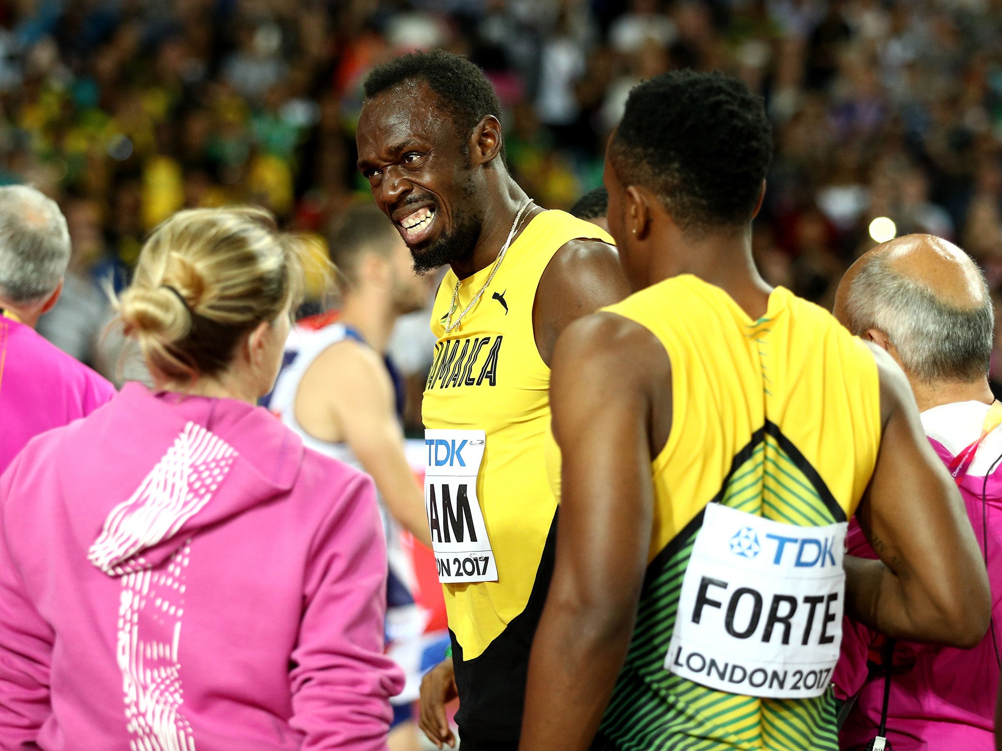 Usain Bolt suffered 'cramp' to end his final race at the World Athletics Championships in injury