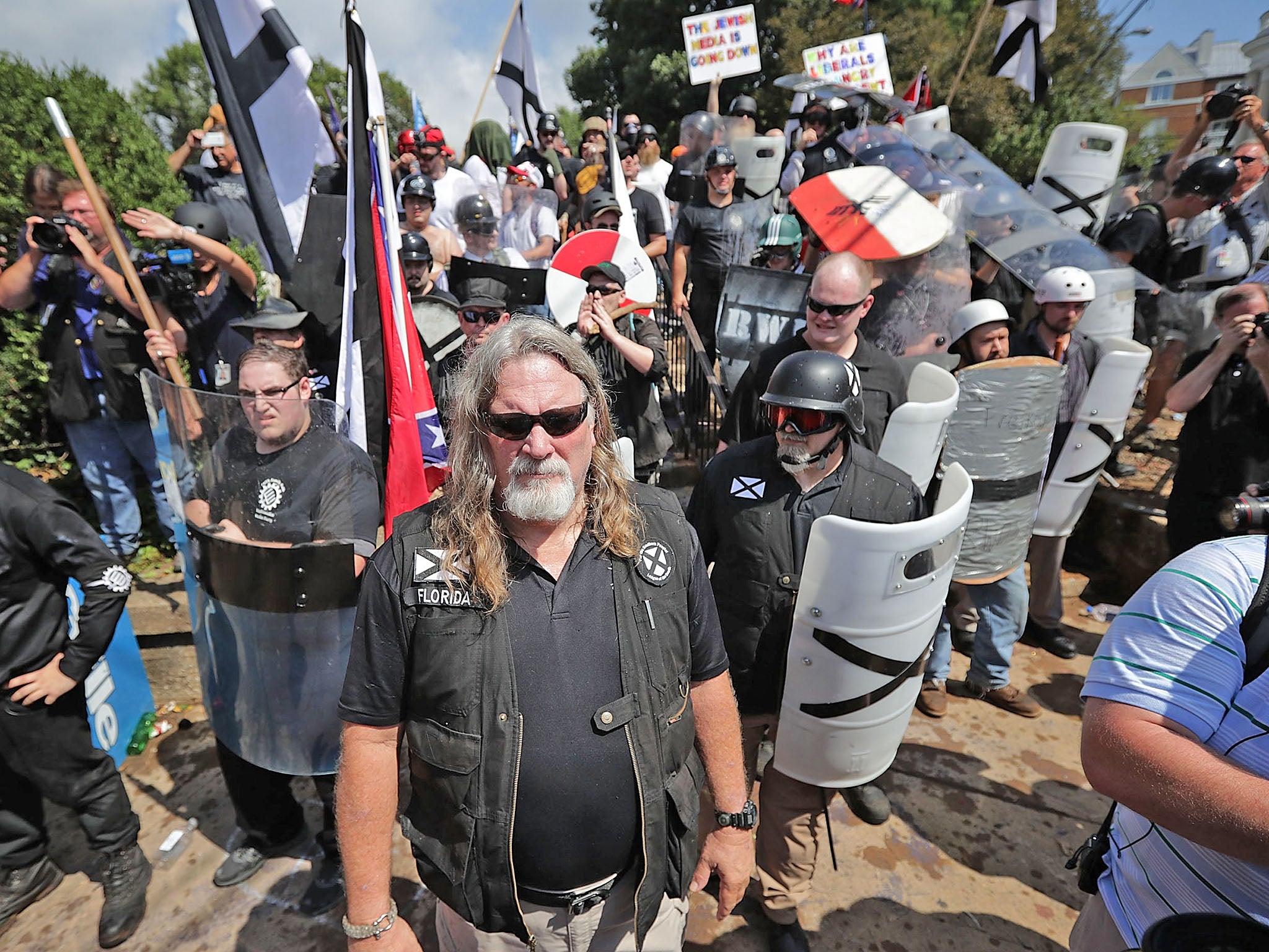 Brawls between people holding KKK banners and confederate flags, and groups of anti-fascist counter protestors spilled onto the streets