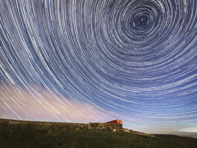 A digital composite of 233 photographs taken over a period of nearly two hours shows meteors and star trails during the Perseid meteor shower seen in the Yorkshire Dales National Park.
