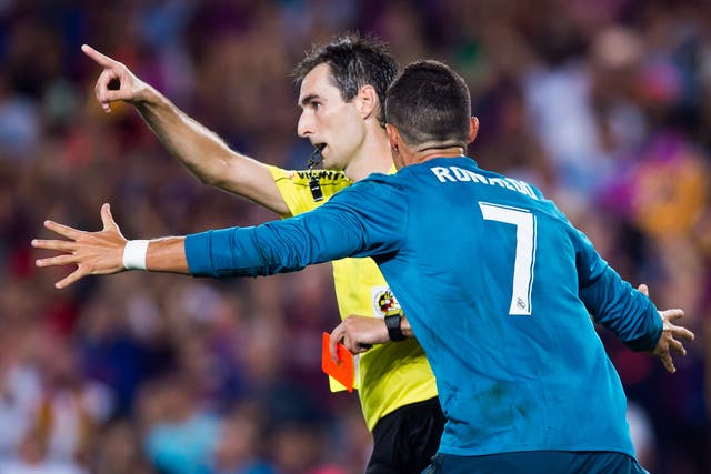 Ronaldo reacted badly to the dismissal and pushed referee Ricardo de Burgos Bengoetxea