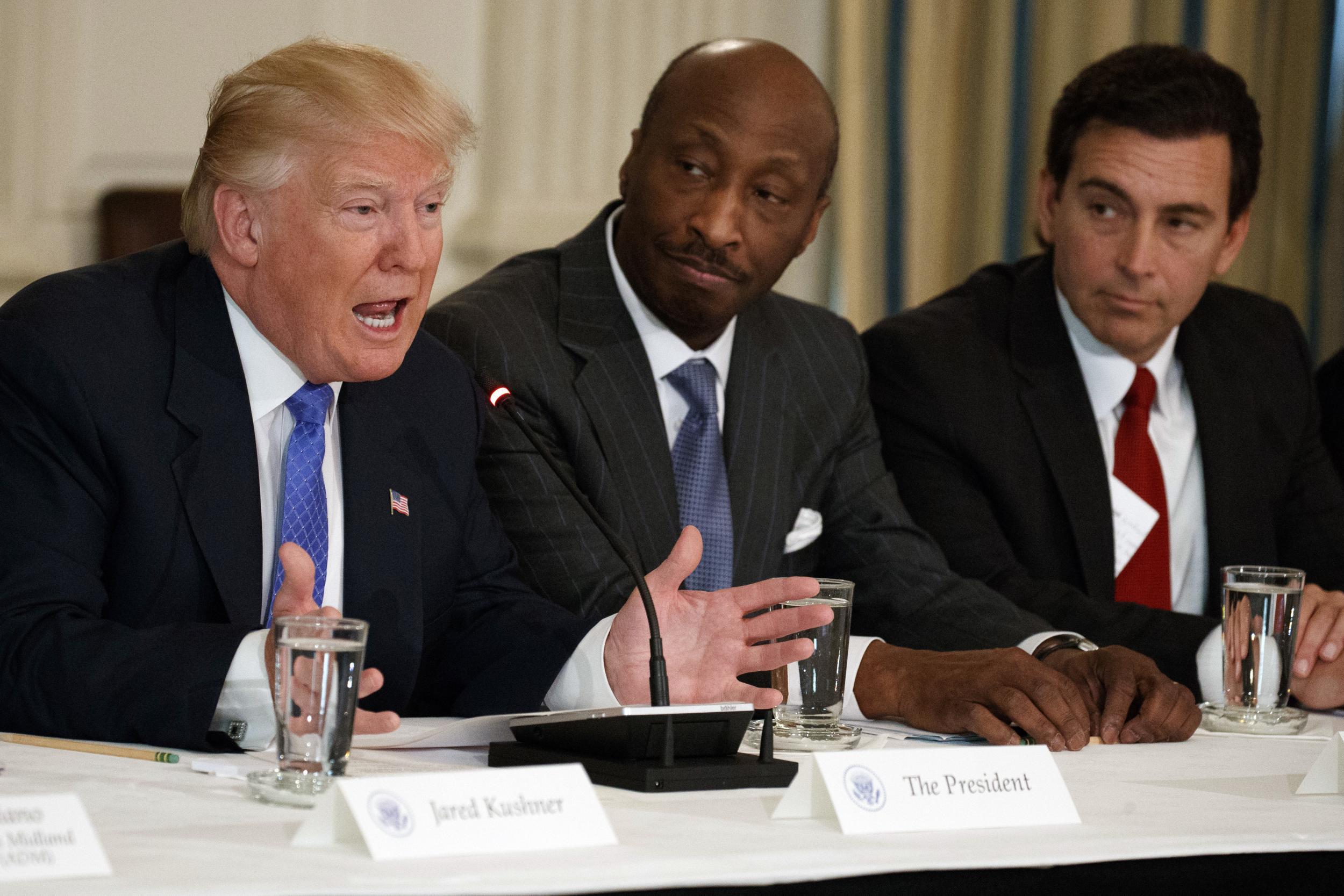 President Donald Trump speaks at a meeting with manufacturing executives including Merck CEO Kenneth Frazier, centre