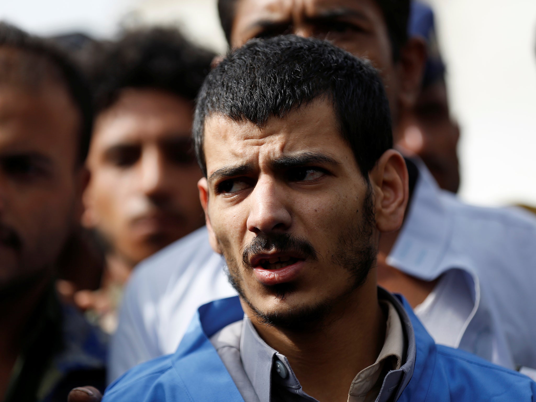 Hussein al-Sakit, 22, is brought to Tahrir Square in downtown Sanaa to be executed after he was convicted of the rape and murder of a young girl