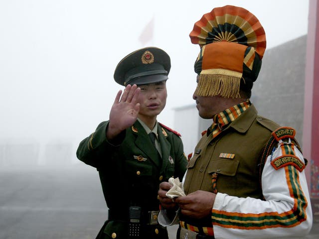China has stepped up its rhetoric in an increasingly tense border row with India, hinting at the possibility of military action