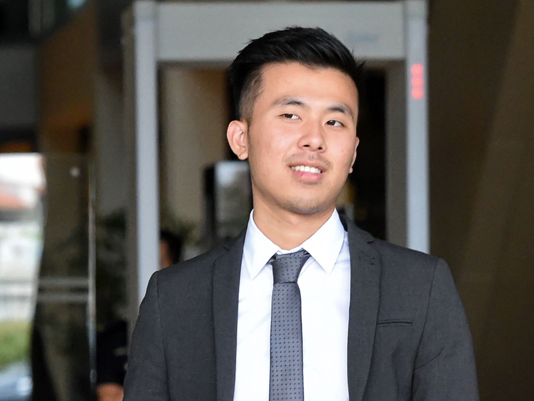 British national Khong Tam Thanh, 22, leaves the Singapore high court on 7 August, 2017