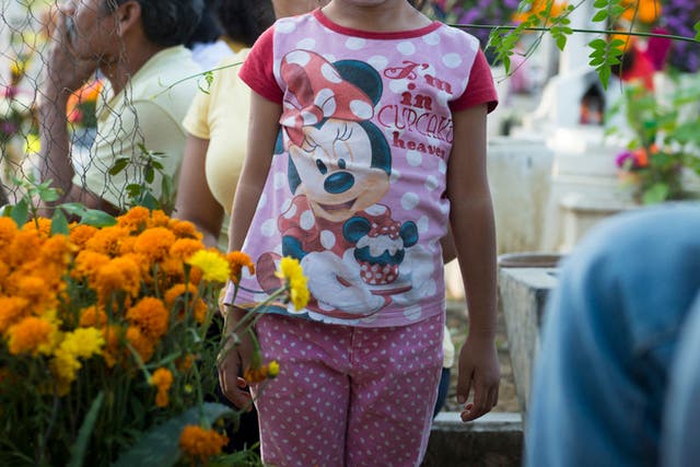 A family was asked to remove personalised Minnie Mouse t-shirts