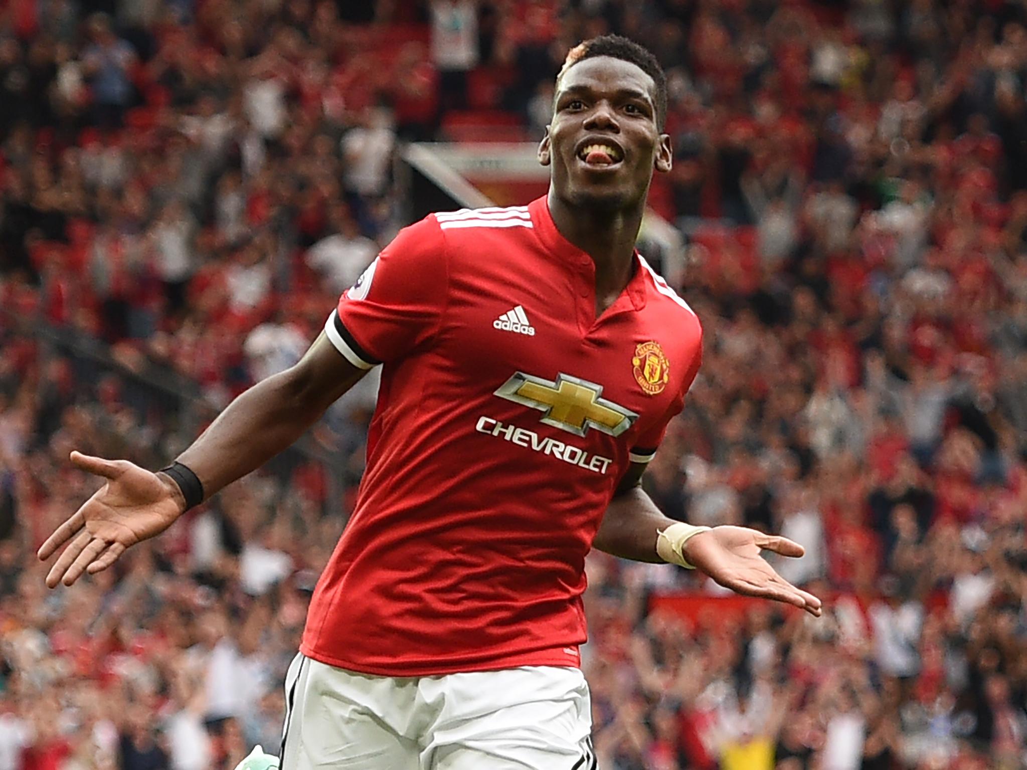 Paul Pogba believes not being the world's most expensive footballer will benefit him at manchester United
