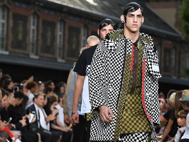 Givenchy adopted the optical grid with a collection overcharged with busy prints