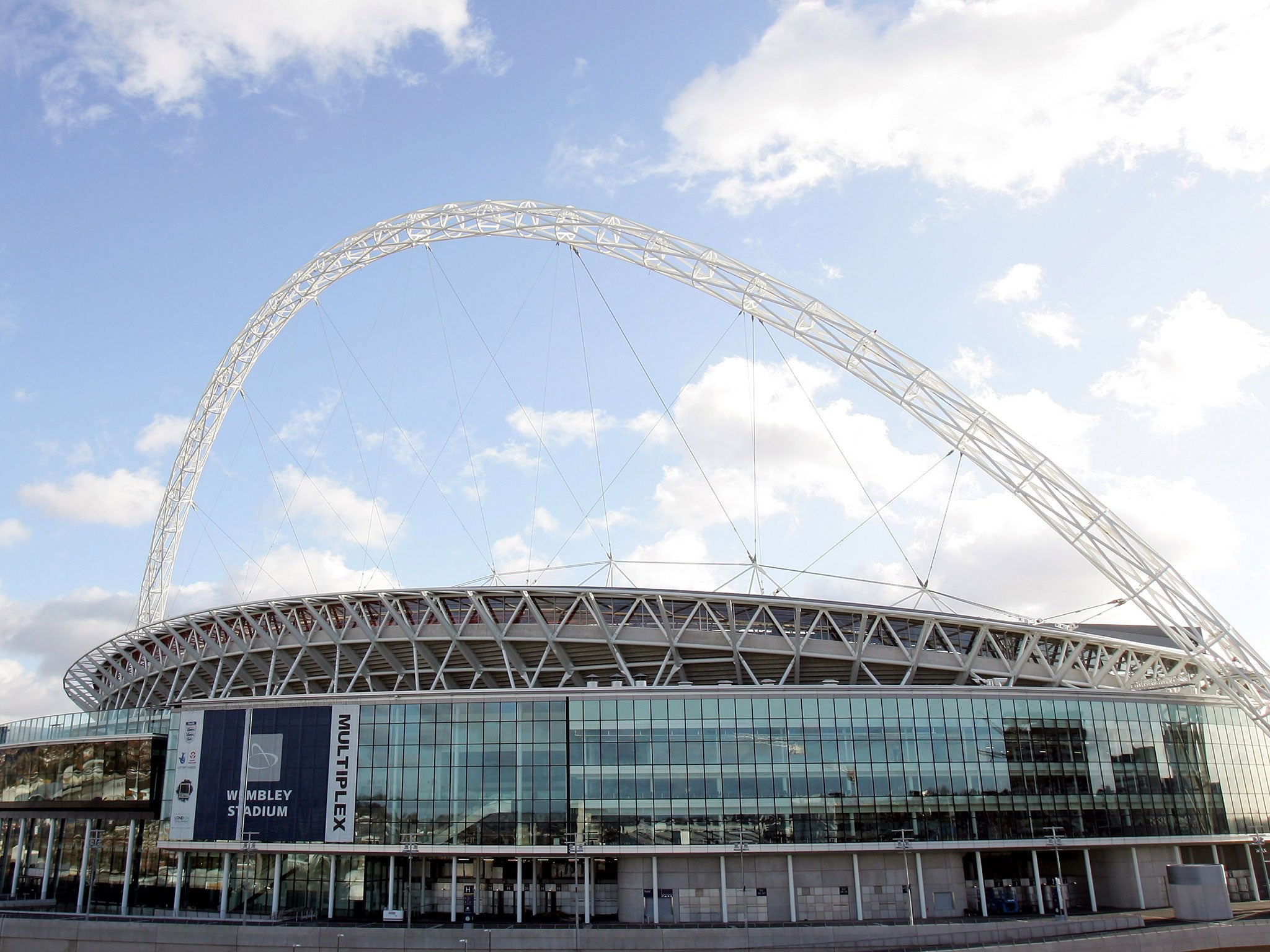 Wembley can hold 90,000 fans for a football match