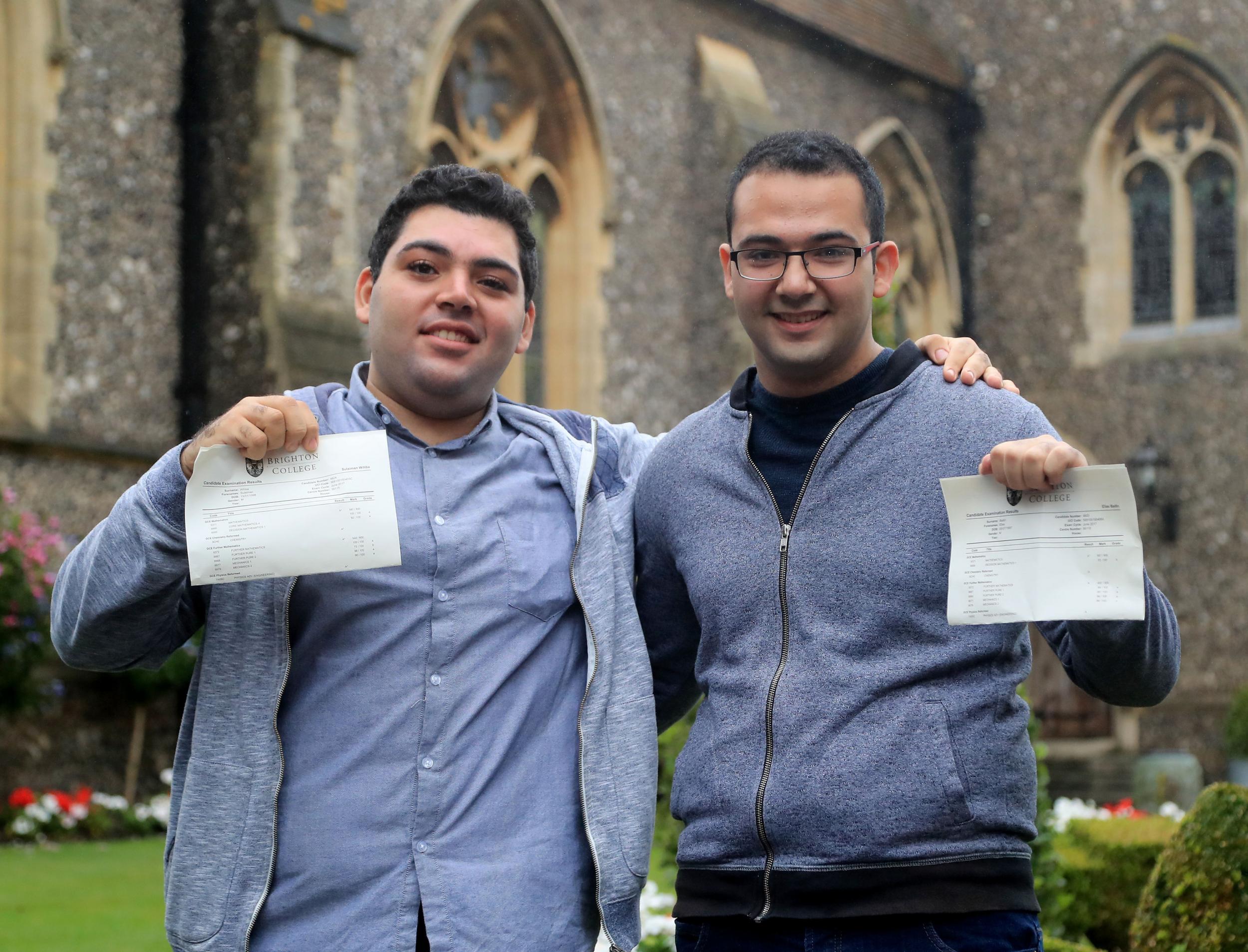 Syrian refugees Sulaiman Wihba, left, and Elias Badin after collecting their A-level results at Brighton College