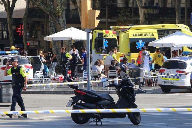 An armed police operation is underway and residents have been told to steer clear of the city's Placa Catalunya