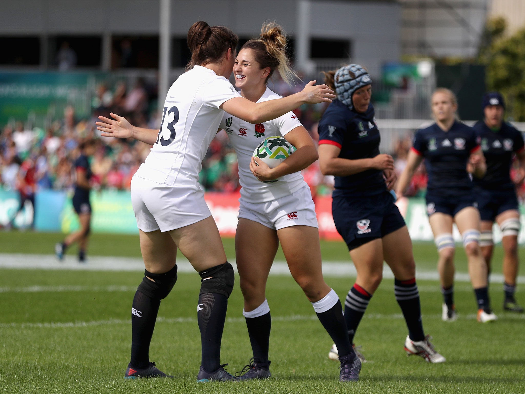 Amy Wilson Hardy celebrates with Emily Scarratt after scoring for England