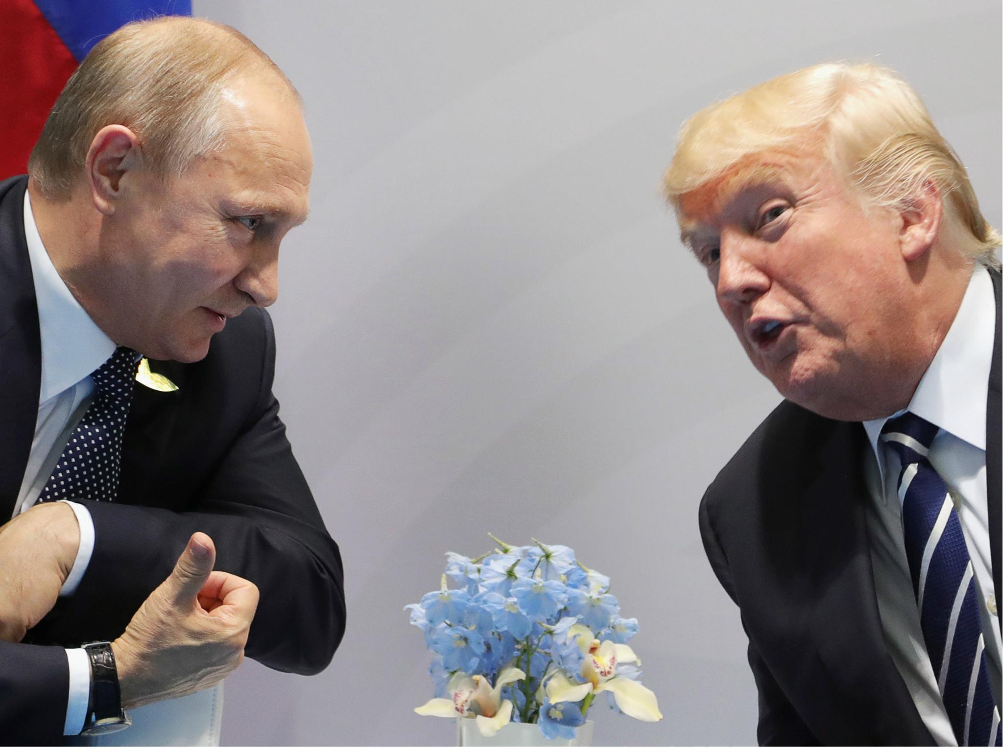 Donald Trump and Vladimir Putin met at the G20 summit in Hamburg, Germany July 2017. Overall more countries trust the Russian leader in world affairs.