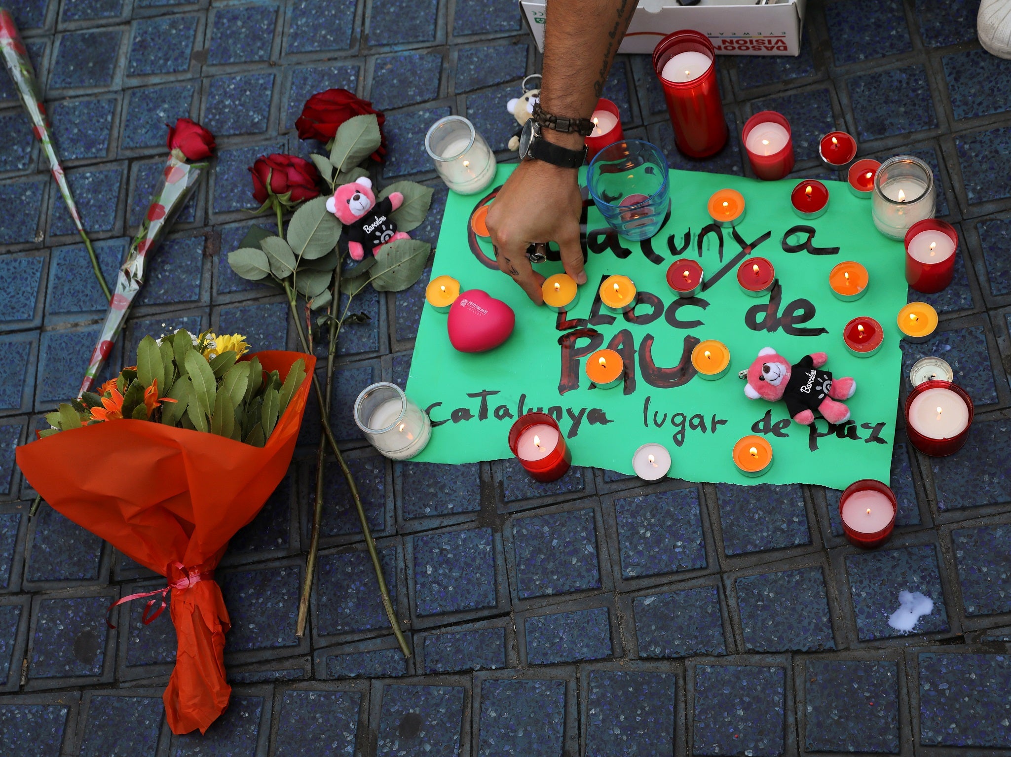 Memorials were placed at the scene where suspected terrorists crashed a van into pedestrians at Las Ramblas in Barcelona