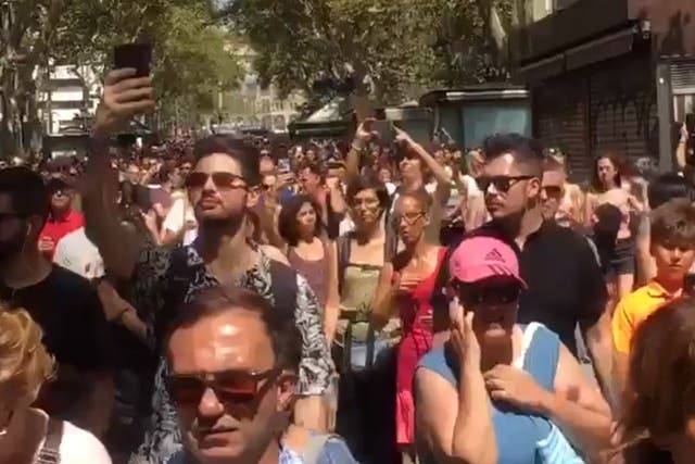 Tourists and locals came together in a show of defiance just a day after the deadly attack
