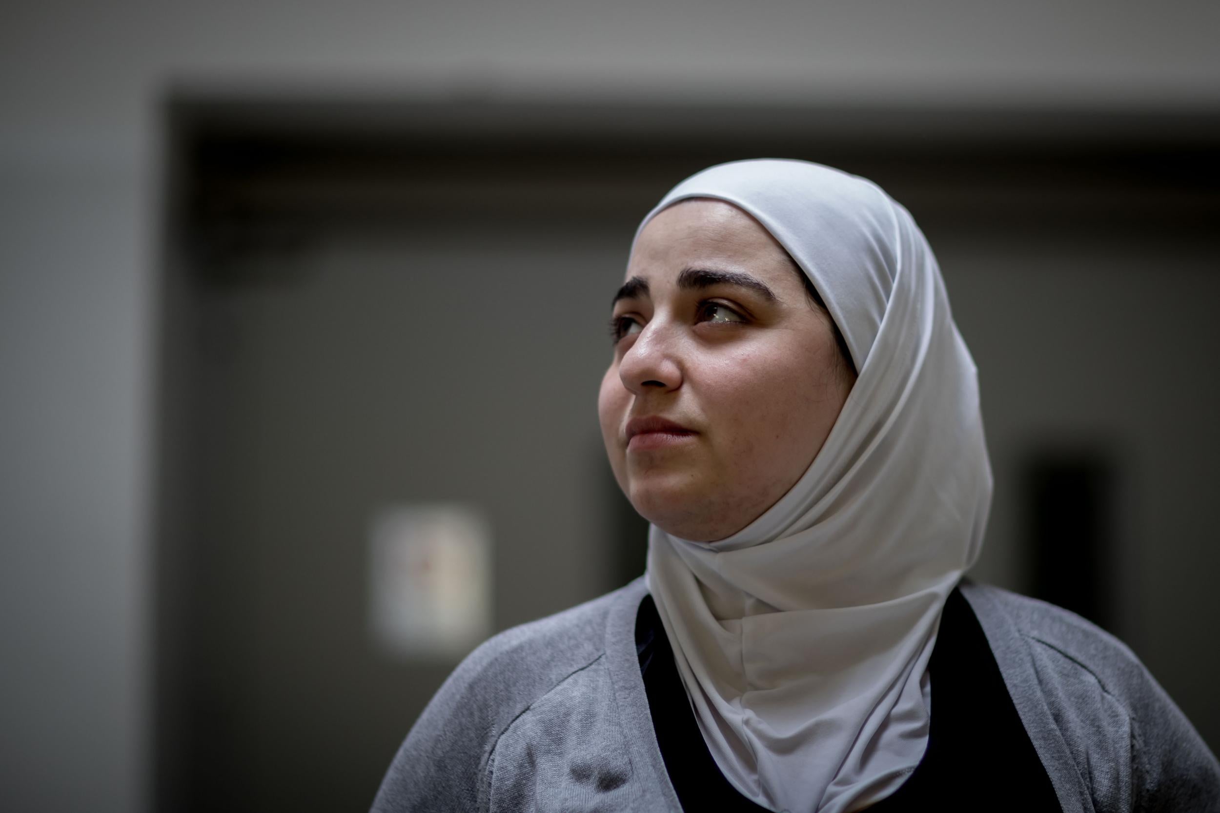 Abier Farhud, a victim of torture and abuse in a Syrian regime prison. She is among seven survivors who have filed a criminal complaint in Germany against secret service officials of Assad's government