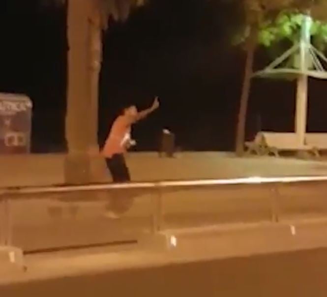 The attacker, who has not been identified, can be seen goading officers as they struggle to neutralise him