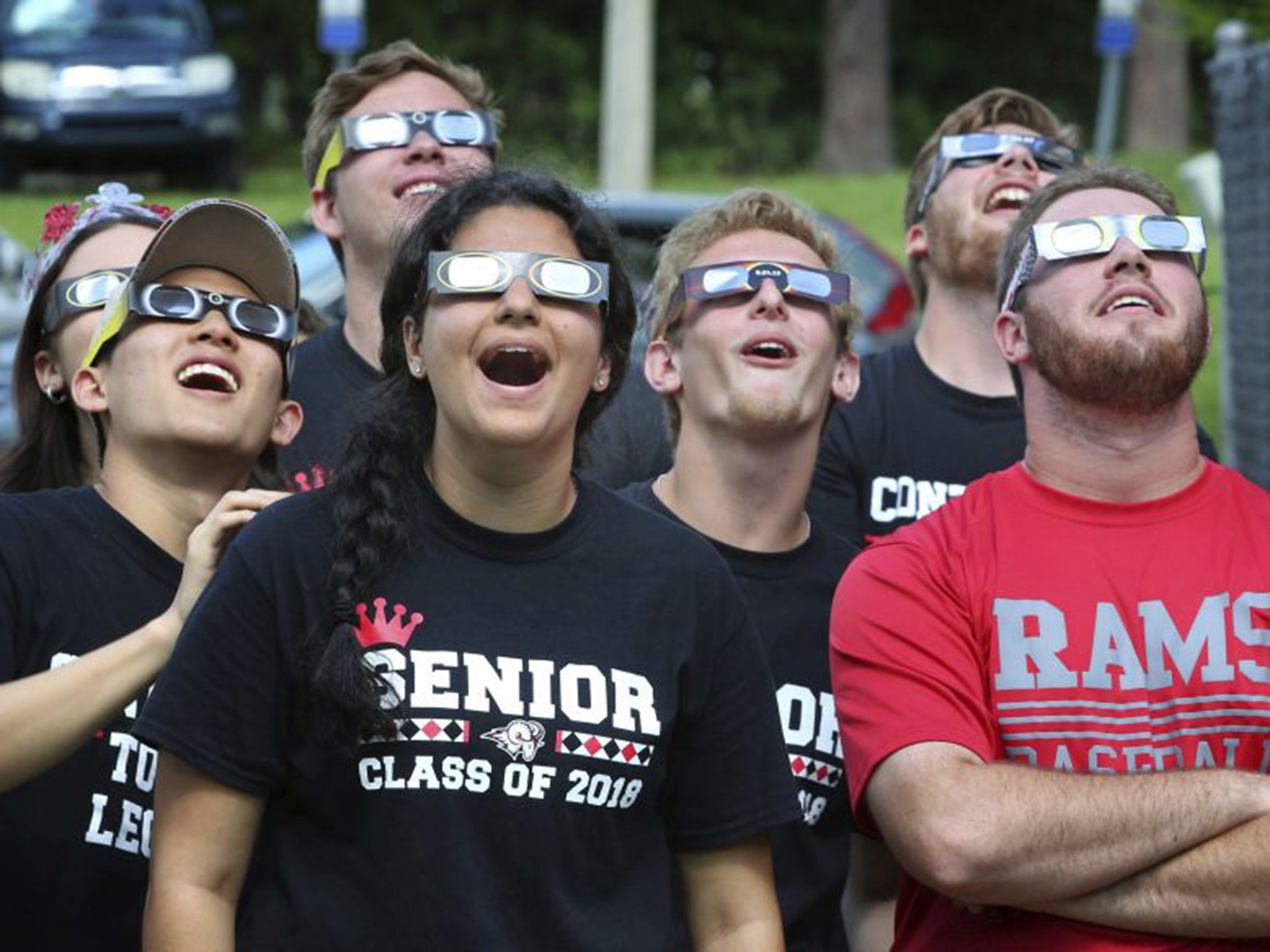 High School students using their eclipse glasses during a trial run yesterday