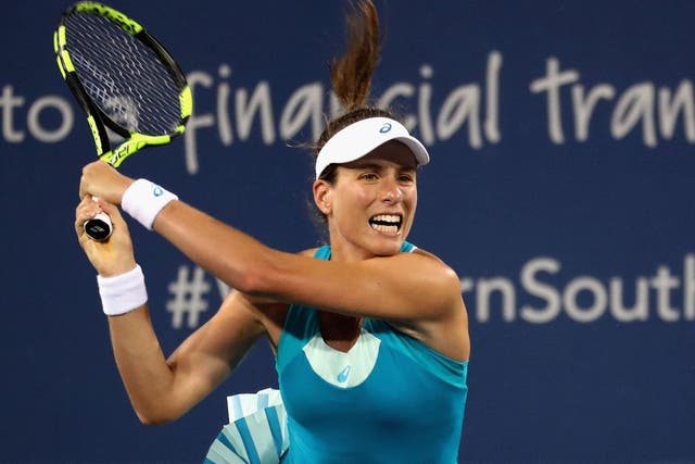 Jo Konta pushed Simona Halep all the way before falling to defeat