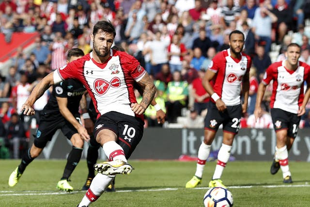 Charlie Austin secures victory for Southampton from the penalty spot against West Ham